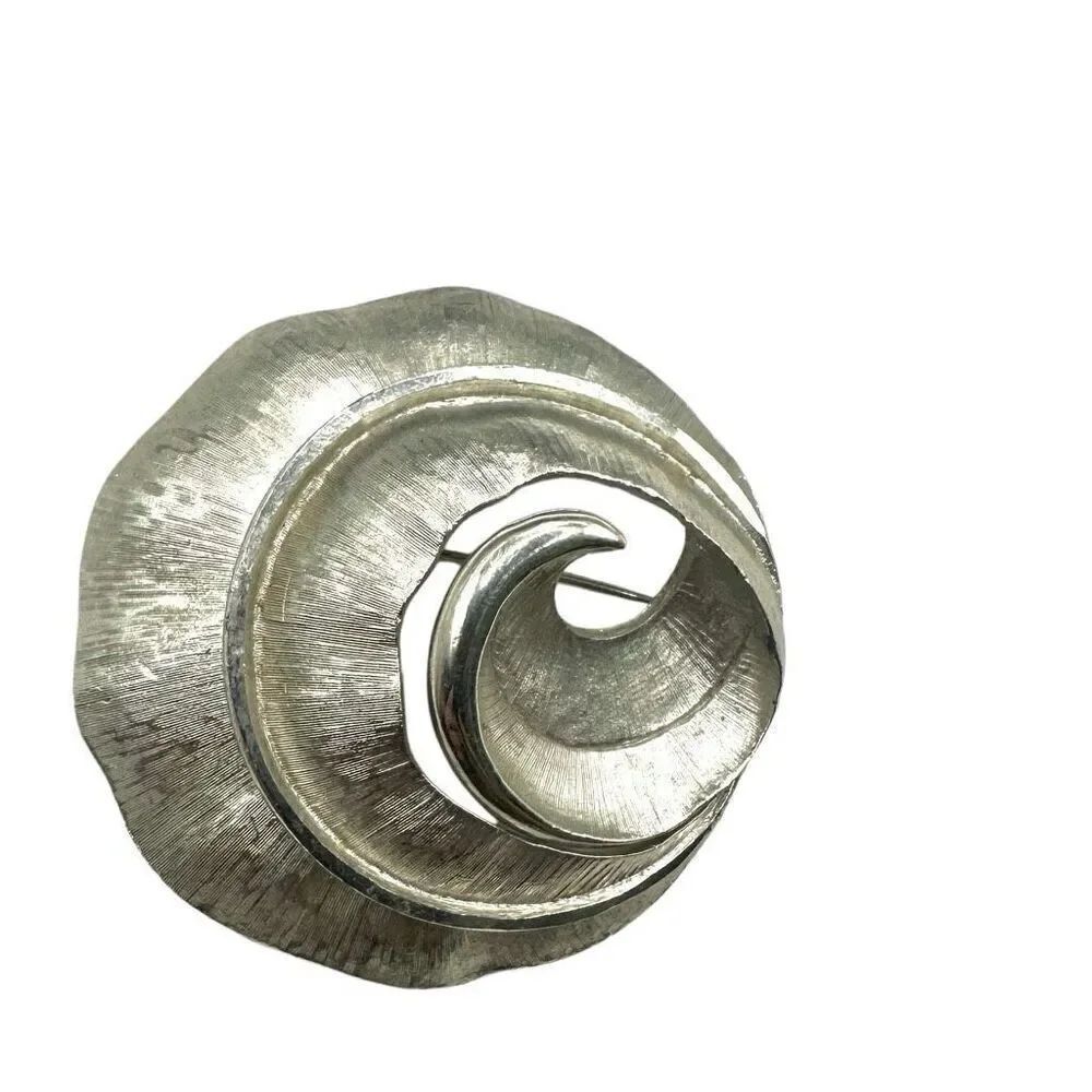 Silver tone circle spiral brooch